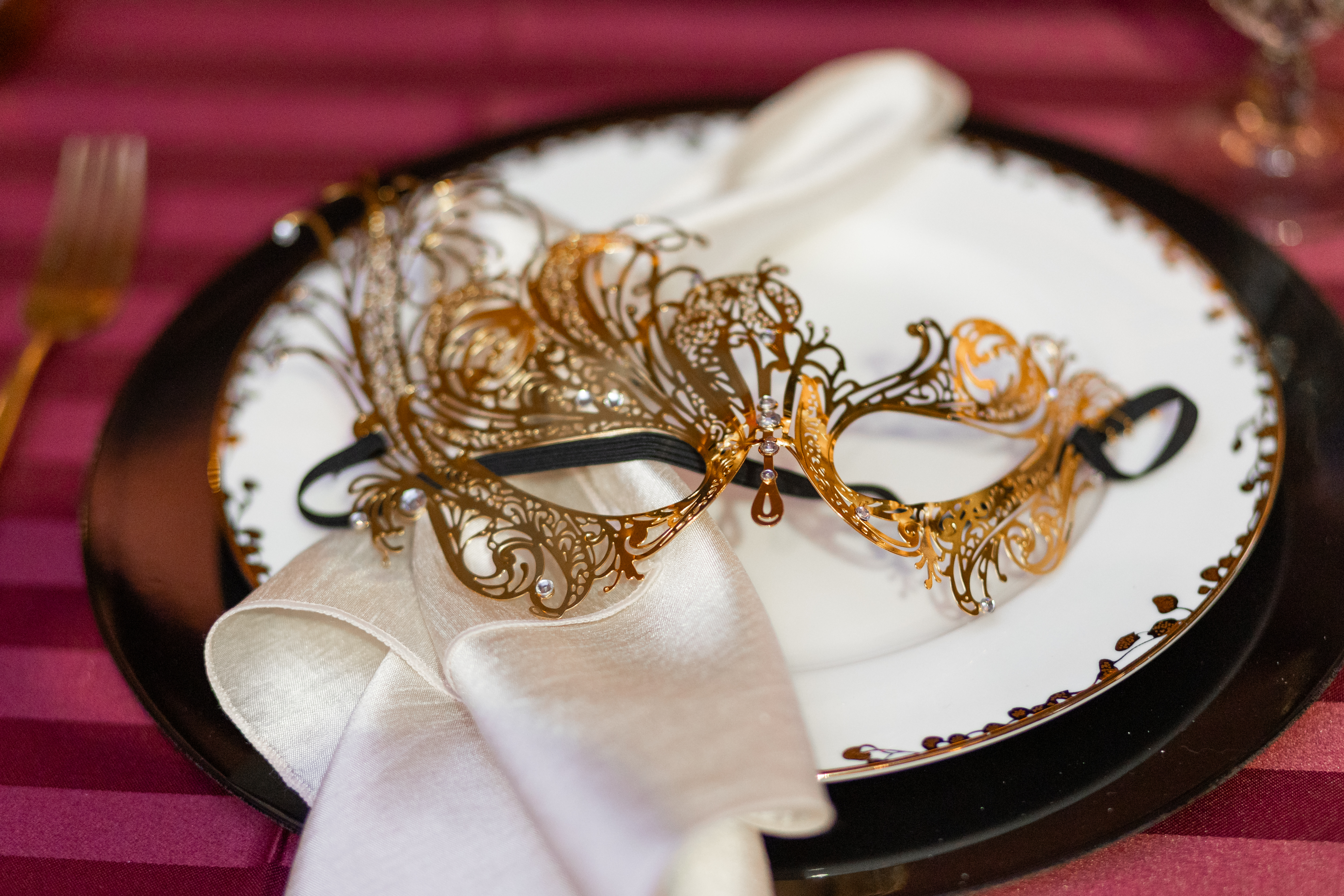 Masquerade Ball Mask on white and gold plate